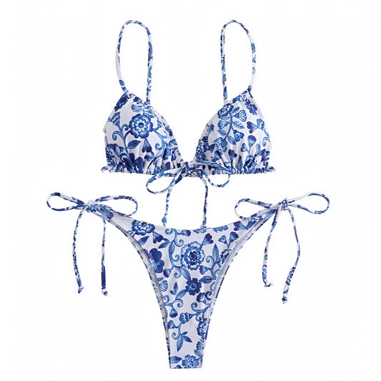 floral-print-dark-blue-and-white-multi-color-flower-patterned-ruched-bow-string-tie-cut-out-spaghetti-strap-sleeveless-v-neck-backless-open-back-wireless-push-up-cheeky-thong-boho-bohemian-2-piece-triangle-bikini-set-top-bottoms-swimsuit-swimwear-bathing-suit-women-ladies-teens-tweens-chic-trendy-spring-2024-summer-elegant-classic-feminine-preppy-style-hawaiian-tropical-european-greece-vacation-coastal-granddaughter-grandmillennial-mamma-mia-beach-wear-frankies-bikinis-blackbough-kulakinis-pacsun-dupe