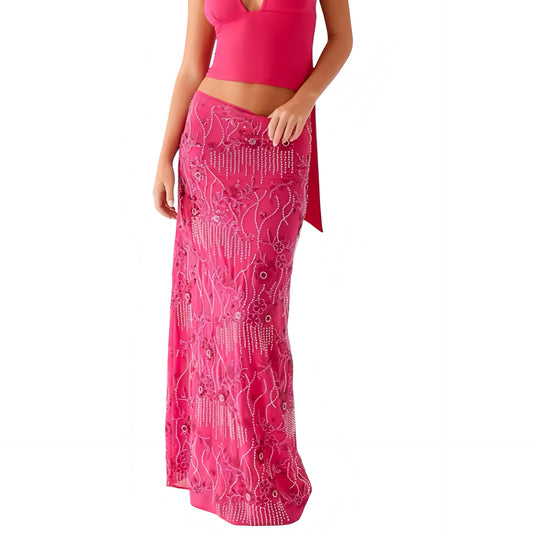 Hot pink floral beaded sequin embellished low-rise maxi skirt with magenta embroidered flower details, shimmering sequins, delicate beadwork, slim silhouette, sheer plisse pleats, and ruffled hemline. Long flowy low-waisted skirt for womens, teens, and ladies. Perfect for summer and fall 2025 feminine chic fashion, elegant trendy holiday wear, euro summer resort outfits, Ibiza boho chic style, high quality affordable evening parties, sexy night out looks, beachside vacations, concerts, raves, and festivals.