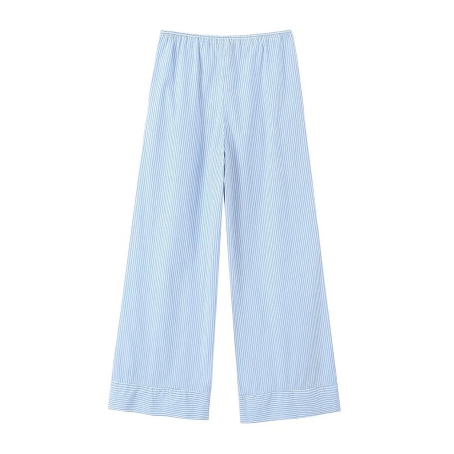 Light blue striped seersucker low-rise linen pants for women with soft breathable cotton blend fabric, adjustable drawstring waistband, and full-length relaxed fit silhouette. Lightweight and comfy coastal resort wear perfect for beach vacations, travel, or casual everyday outfits. Classic nautical pinstripe design in baby blue and white. Ships globally to the US, UK, Canada, Europe, Australia, and Asia.