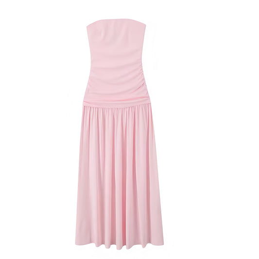 Light pink strapless bodycon ruched pleated maxi dress for women and teens. Slim fit corset bustier silhouette with sheath, shift, and pencil dress influence. Strapless sleeveless backless design with ruched detailing, plissé pleats, ruffled accents, and drop waist A-line shaping. Elegant and feminine sundress for summer, holidays, Euro vacation, brunch, graduation, prom, homecoming, sorority rush, formal evening events, parties, or going out. Coquette Y2K chic preppy fashion. Ships worldwide to USA, UK, CA