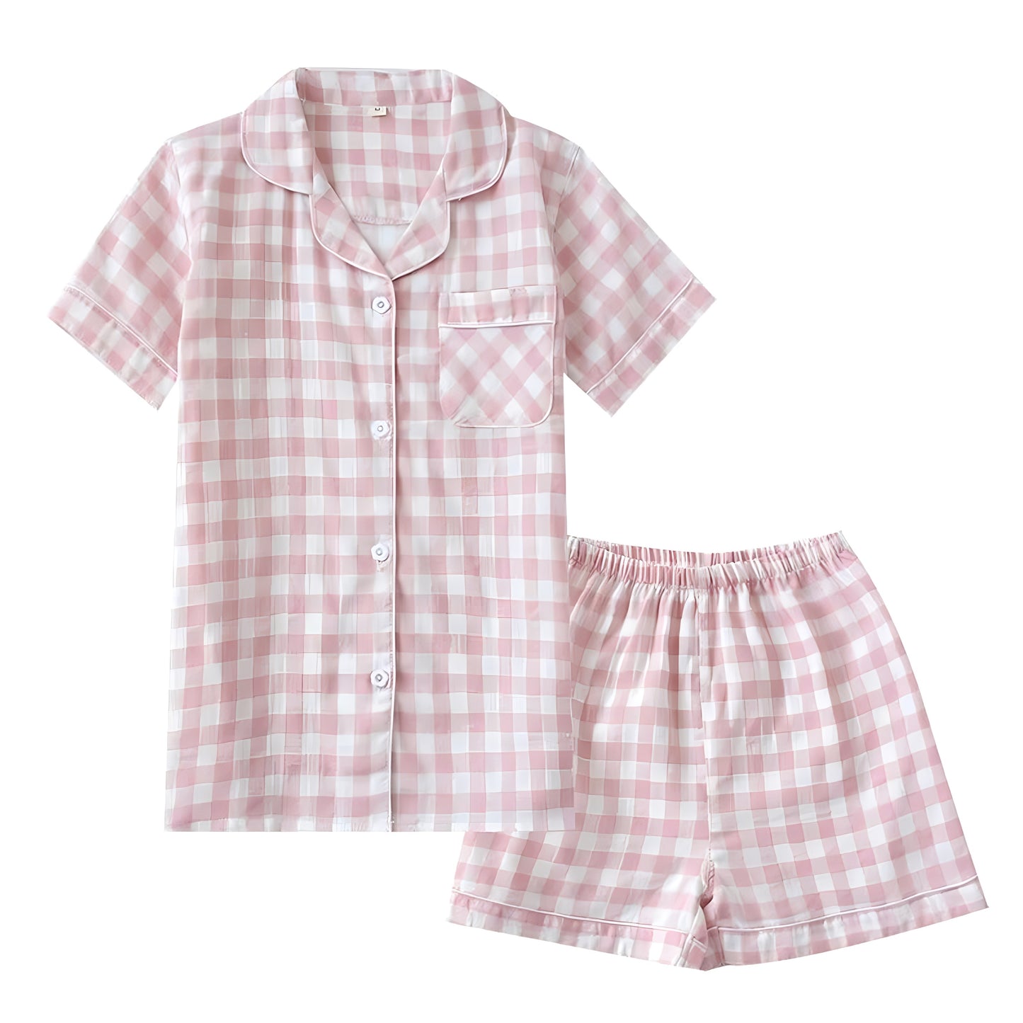 Light pink and white checkered pajama set for women featuring a soft cotton blend fabric. Two piece matching set with a short sleeve button down collared top, v neckline, front pocket, and elastic waist shorts. Lightweight, breathable, and cozy for everyday lounging, sleepwear, and holiday relaxation. Inspired by Roller Rabbit and Eberjey. Ships globally and worldwide to US, UK, Canada, Australia, New Zealand, Europe, Asia, and more.