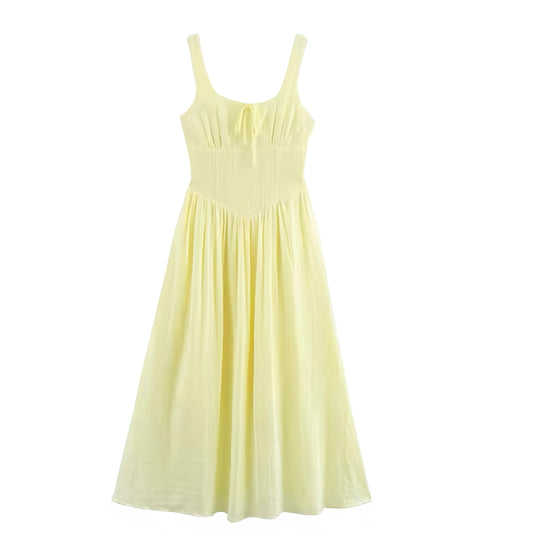 Light yellow linen sleeveless drop-waist milkmaid maxi dress for women and teens. Butter yellow slim fit corset bustier bodycon silhouette with A-line peplum skirt, ruffled pleated plissé flared hem, retro square neckline, scoop neck split detail, spaghetti straps, backless sundress style. Elegant feminine vintage-inspired dress for summer holidays, Euro summer, beach girl fashion, chic coquette, preppy Hamptons and Nantucket style. Perfect for prom, homecoming, brunch, graduation, party, or everyday wear.