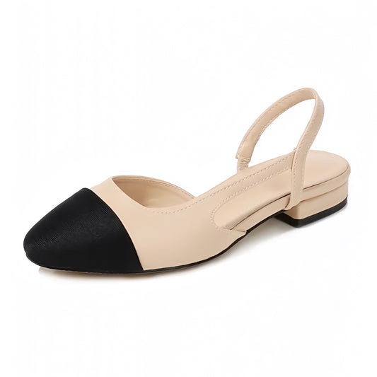 Beige and black contrast toe slingback low-block ballet silhouette heels made of smooth vegan-friendly faux leather. Features cushioned insoles, adjustable slingback strap, and a sleek almond toe for comfort and style. Minimalist, elegant, and versatile for office wear, day outings, and evening looks. Ships globally to the US, UK, Canada, Australia, New Zealand, and across Europe and Asia.

