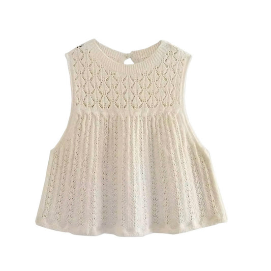 Beige eyelet knit crochet sleeveless hollow-out crop top for women, teens, and ladies. Cream white embroidered floral and geometric crochet knitwear design with slim fit silhouette, round neck, sleeveless cut, and hollow-out cut-out detailing. Backless chic blouse crop top with translucent knit construction, perfect for summer 2025 holidays, vacations, Euro summer, Ibiza beach club fashion, boho chic, Stockholm streetwear, Mediterranean Greece coastal granddaughter style, preppy resort wear, everyday chic.