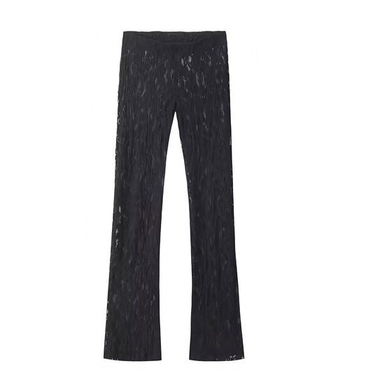 Black lace low rise translucent flare pants with floral patterned design. Slim fit skinny leggings style low waisted flare trousers. Women’s and teens’ summer and fall 2025 fashion. Feminine chic trendy Y2K poster girl style for holiday, vacation, casual everyday outfits, sorority rush, school, elegant evening looks, party, night out, going out, sexy club wear, rave, festival, concert wear. Ships worldwide to USA, Australia, New Zealand, UK, Canada, Germany, France, Ireland, Denmark, Sweden, Europe 
