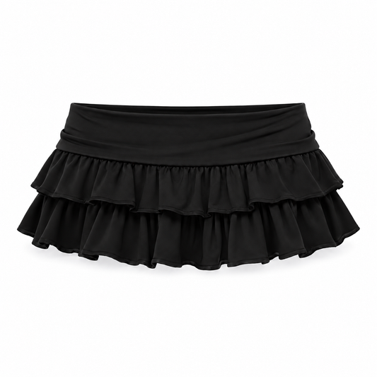 Black low-rise plisse layered ruffle micro mini skirt for women with wide foldover waistband, double-tier gathered ruffles, cascading flounce hem and flared A-line silhouette. Ultra short Y2K 2000s skirt for coquette, gothic coquette, goth, grunge, punk, emo, cybergoth, alt, rock chic, indie sleaze, rave, festival, clubwear, baddie, boho, western, Halloween, night out and party outfits 2026.