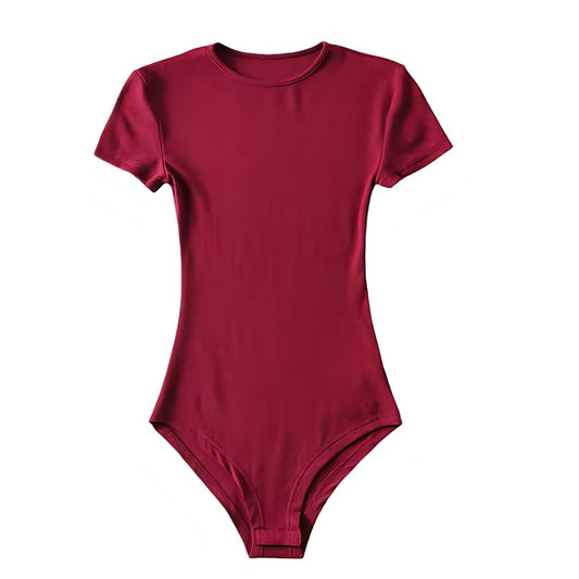 Burgundy red bodycon short sleeve bodysuit made from a soft, stretchy cotton blend fabric. Features a crewneck, slim fitted silhouette, and smooth seamless design for a flattering, feminine fit. Perfect for layering or wearing as a chic minimalist top with jeans, skirts, or trousers. Ideal for casual, everyday, or evening outfits. Ships globally to the US, UK, Canada, Australia, New Zealand, Europe, and Asia.

