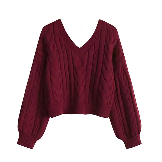 Burgundy red cable knit v-neck cropped long sleeve sweater for women featuring soft chunky knit fabric with woolen texture, ribbed cuffed sleeves, lightweight yet warm and breathable construction, and relaxed oversized fit. Cozy red knitwear jumper perfect for autumn, fall, and winter 2025 and 2026, Scandinavian Stockholm style, minimalist everyday outfits, school and university fashion. Ships worldwide.