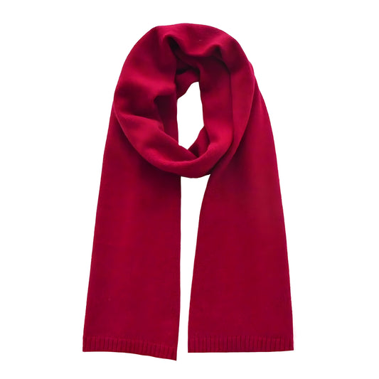 Burgundy red oversized knit wool scarf for women made from soft, plush wool blend yarn with a chunky knit texture. Thick, cozy, and warm scarf perfect for layering over winter coats and sweaters. Rich red hue adds an elegant and timeless touch to feminine fall and winter outfits. Inspired by Scandinavian minimalism and luxury knitwear trends. Ships worldwide to US, UK, Canada, Australia, New Zealand, Europe, and Asia.