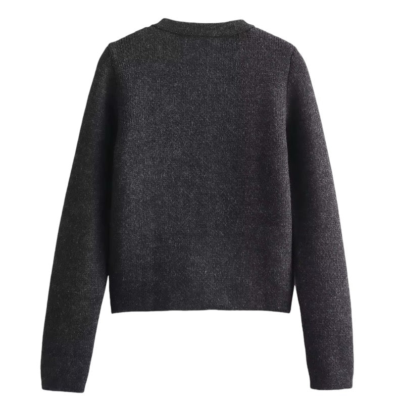 Charcoal Black Knit Gold Button-Down Long Sleeve Cardigan Sweater for women and teens. Soft, cozy, and lightweight woolen knitwear with elegant gold buttons and classic silhouette. Feminine, preppy, and chic cardigan sweater inspired by Parisian fashion, old money, and clean girl style. Perfect for fall, autumn, and winter 2025 outfits. Ships globally and worldwide to the US, UK, Canada, Australia, Europe, and Asia.