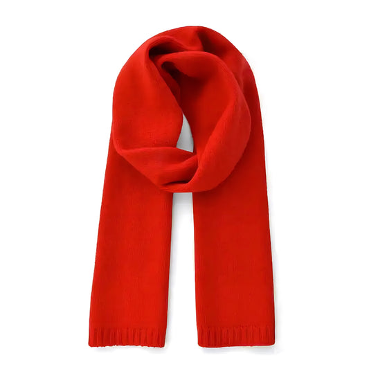 Cherry red oversized knit wool scarf for women made from soft plush wool blend yarn. Thick, cozy, and chunky knit texture ideal for fall and winter layering. Elegant, vibrant red hue perfect for adding warmth and color to minimalist cold-weather outfits. Soft, fuzzy, and warm accessory inspired by Scandinavian street style and luxury knitwear trends. Ships worldwide to US, UK, Canada, Australia, New Zealand, Europe, and Asia.
