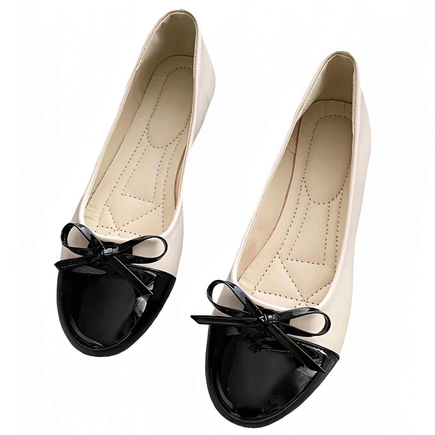 Cream white and black faux patent leather ballet flats featuring a glossy contrast black toe and delicate bow detail. Smooth, vegan-friendly finish with a soft padded insole, low heel, and round toe silhouette. Elegant and comfy, these classic slip-on shoes blend Parisian chic and old-money fashion. Perfect for work, evening, or travel outfits. Ships globally to US, UK, Canada, Australia, New Zealand, and Europe.