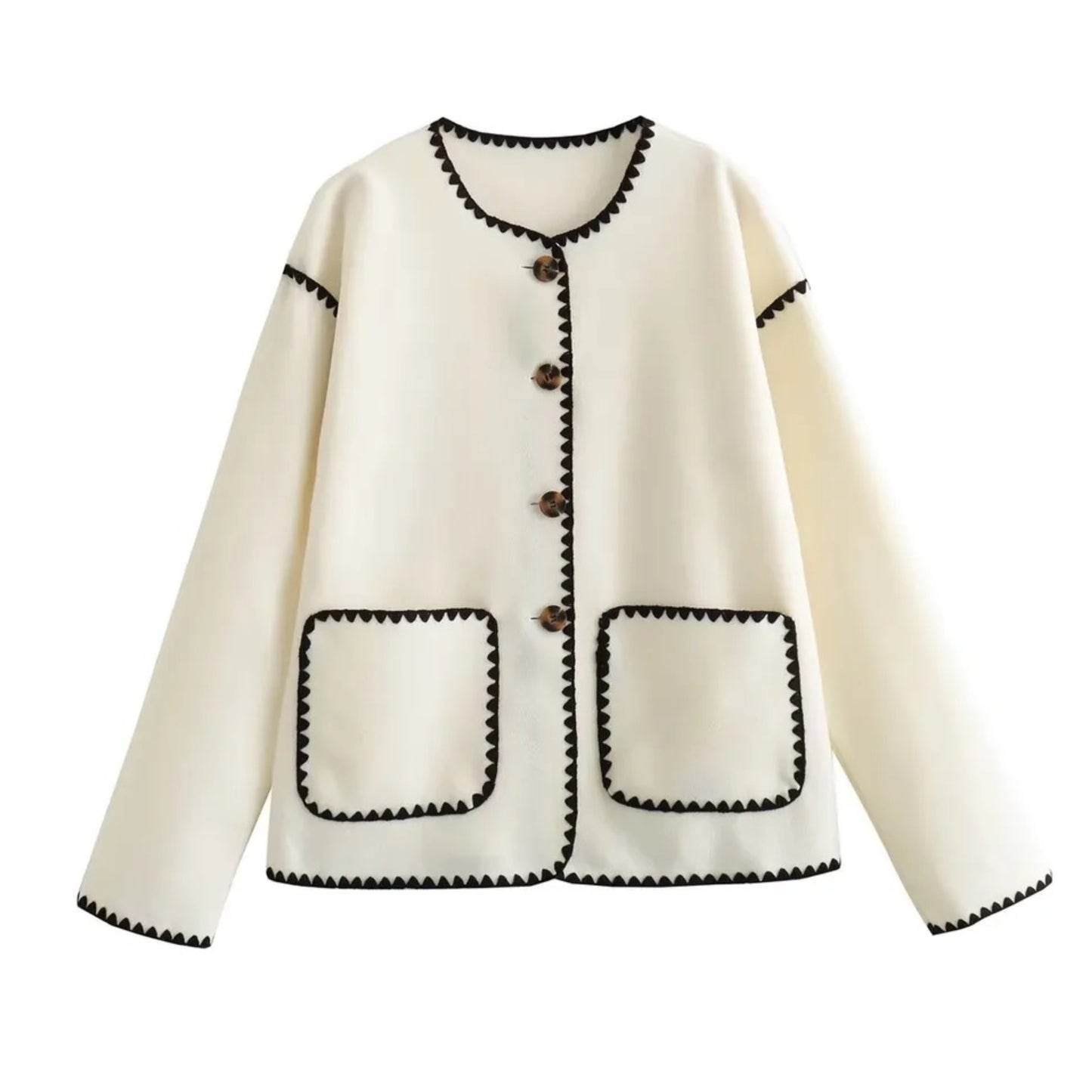 Cream White & Black Trimmed Knit Woolen Oversized Long Sleeve Cardigan Sweater for women and teens. Soft, cozy, and warm oversized knitwear with elegant black lining and tortoiseshell button details. Stylish and feminine fall, autumn, and winter sweater jacket inspired by old money, Parisian chic, and Scandinavian fashion. Ships globally and worldwide to the US, UK, Canada, Australia, Europe, and Asia.