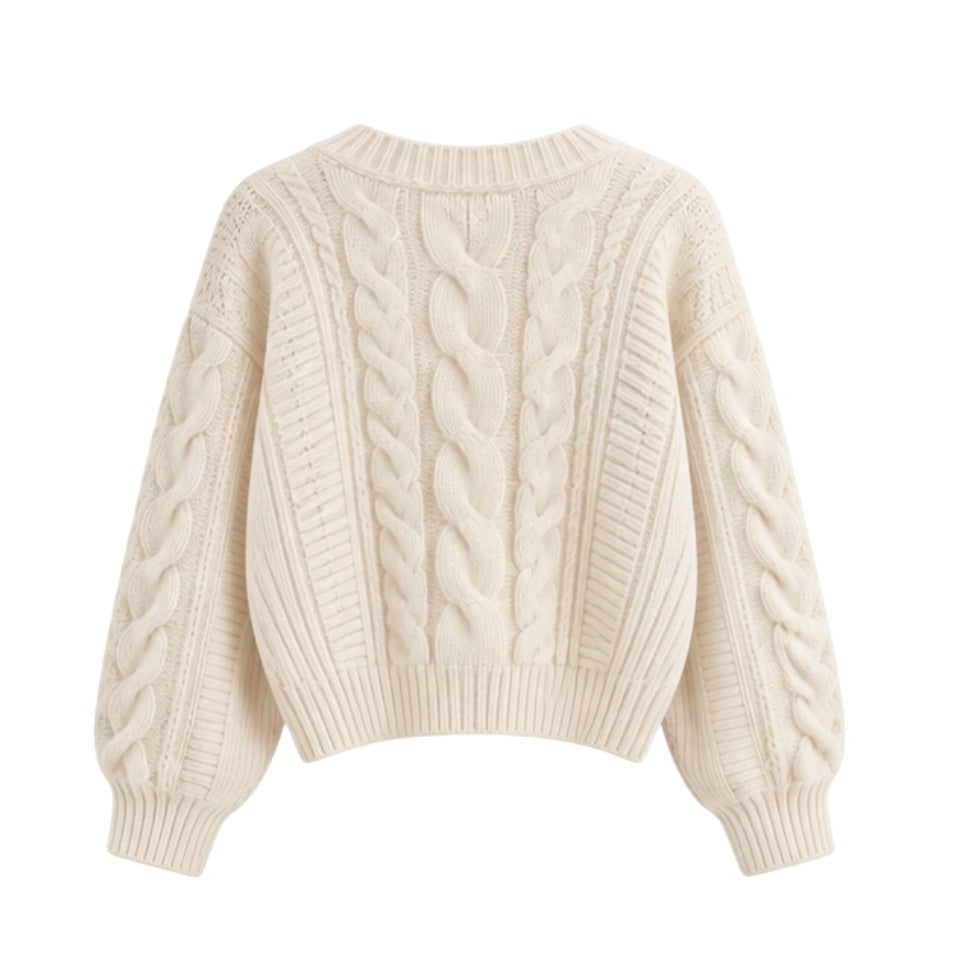 Cream white cable knit v-neck long sleeve cropped cardigan sweater for women. Soft, cozy, thick, and oversized chunky knit jumper with buttons and pockets. Elegant neutral off-white knitwear for fall, autumn, and winter 2025. Feminine preppy casual fashion for teens and ladies. Comfy warm crochet-style sweater inspired by pumpkin spice and Uggs. Ships globally to the US, UK, Canada, Australia, New Zealand, Europe, Asia, France, Germany, Italy, Spain, Denmark, Sweden, Switzerland, Netherlands, Poland.