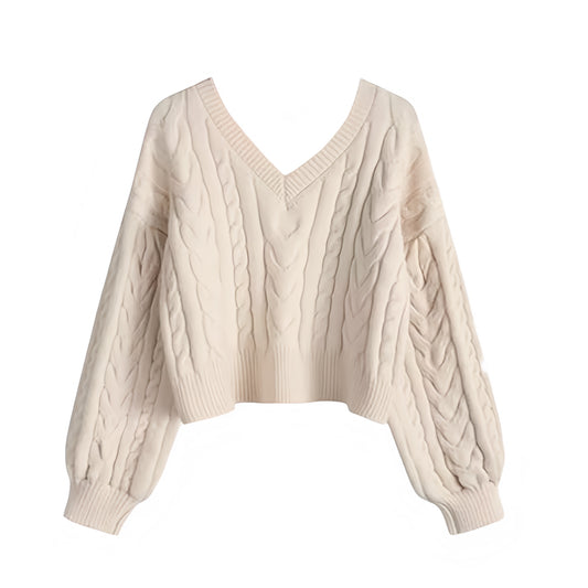 Cream white cable knit v-neck cropped long sleeve sweater for women featuring soft chunky knit fabric with woolen texture, ribbed cuffed sleeves, lightweight yet warm and breathable construction, and relaxed oversized fit. Cozy off white and beige knitwear jumper perfect for autumn, fall, and winter 2025 and 2026, Scandinavian Stockholm style, minimalist everyday outfits, school and university fashion. Ships worldwide.