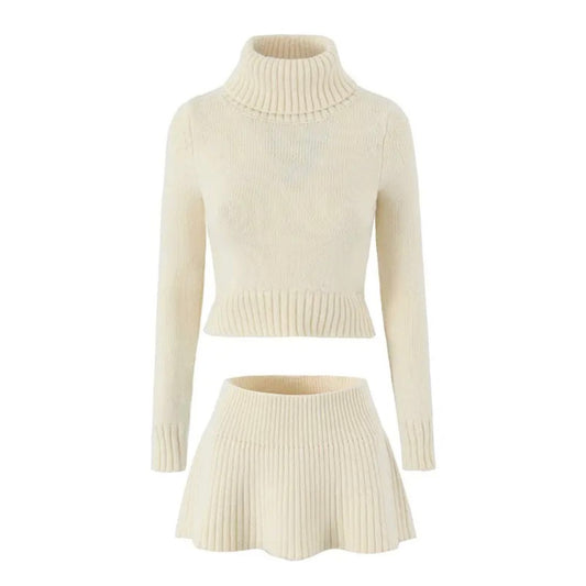 Cream White Knit Ribbed Slim Fit Turtleneck Long Sleeve Sweater & Mini Skirt 2 Piece Set for women and teens. Soft, cozy, and elegant knitwear matching set with a cropped slim-fit sweater and high-waisted mini skirt. Chic, feminine, and trendy outfit for fall, autumn, and winter 2025. Ships globally and worldwide to the US, UK, Canada, Australia, Europe, and Asia.