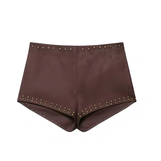 Dark brown faux suede studded slim fit skinny low-rise mini micro booty short shorts for women, teens, and ladies. Sexy tight fitting vintage retro western cowgirl Y2K fashion shorts. Perfect for casual chic outfits, evening party wear, going out, club wear, rave, festival, concert, boho chic, street style, Halloween, adults costume, halloweekend 2025. Available with global worldwide shipping to US, Australia, New Zealand, UK, Canada, Europe, Asia, Germany, France, Spain, Italy, and more.