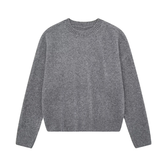 Dark Grey Knit Woolen Long Sleeve Pullover Sweater for women and teens. Soft, cozy, thick ribbed knitwear with a relaxed fit and round neckline. Elegant and trendy heather grey chunky knit jumper perfect for fall, winter, and holiday outfits. Feminine Scandinavian, soft girl, clean girl, and preppy aesthetic knitwear. Ships globally and worldwide to the US, UK, Canada, Australia, Europe, Asia, and more.
