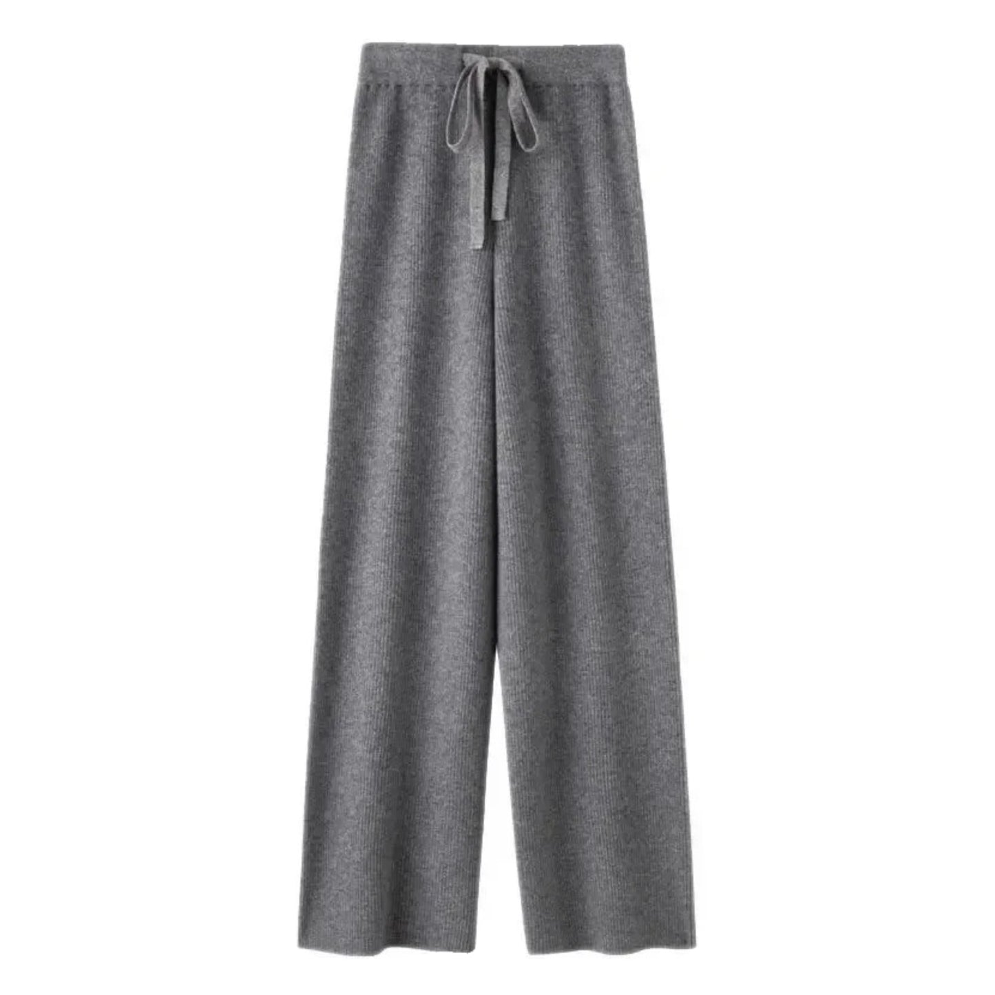 Dark grey knit straight leg mid-rise lounge pants for women made from soft, cozy, and warm knitted fabric. These elevated wool blend trousers feature a relaxed yet structured fit with a full-length silhouette, perfect for everyday comfort or travel. Ideal for minimalist fashion, Scandinavian streetwear, or après-ski looks. Stylish, comfy, and versatile knitwear pants that ship globally and worldwide to the US, UK, Canada, Australia, and Europe.
