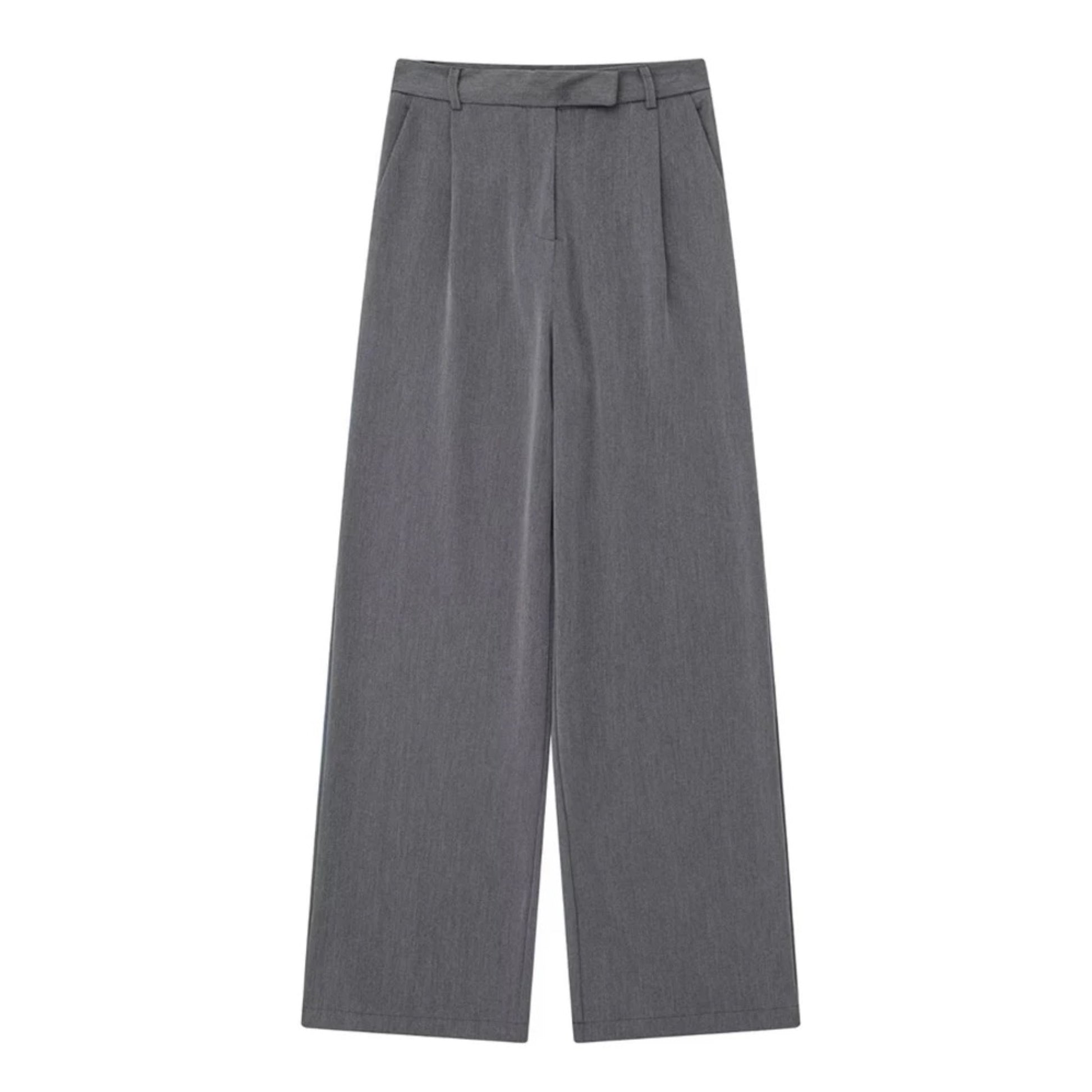 Dark grey low-rise pleated tailored straight leg trouser pants for women featuring a smooth woven suit fabric, structured fit, and elevated minimalist design. These full-length sleek trousers blend Scandinavian simplicity with timeless tailoring. Perfect for modern office wear, evening looks, or capsule wardrobe outfits. Inspired by European fashion and Stockholm style. Ships globally and worldwide to US, UK, Canada, Australia, and across Europe and Asia.