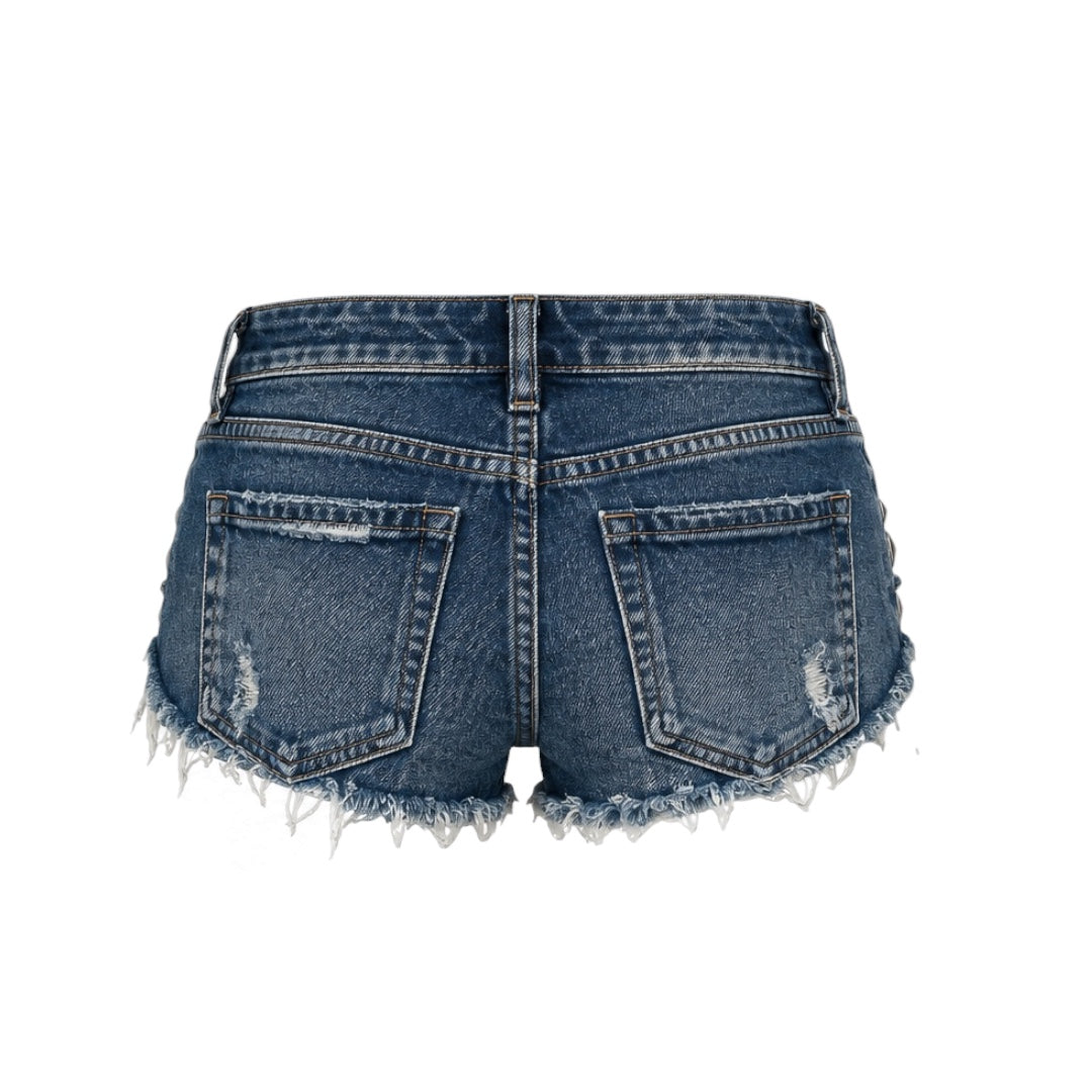 Dark wash blue Y2K studded denim low-rise micro shorts with silver metallic pyramid studs, distressed ripped details, faded vintage wash, belt loops, front and back pockets, button closure and raw frayed cutoff hem. Women’s ultra-short jean hot pants and booty shorts for 2000s Y2K, baddie, rock chic, rockstar GF, grunge, punk, western, goth, emo, cybergoth, dark feminine, opiumcore, streetwear, club, rave, festival, concert, party and fall 2026 outfits.

