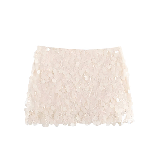 Ivory cream white sequin embellished slim fit low-rise mini skirt; sparkly pencil/sheath short skirt, feminine sexy Ibiza style festival party club rave concert Euro summer vacation boho chic trendy Y2K 2025. Ships worldwide to US, UK, EU, AU, Canada and more.