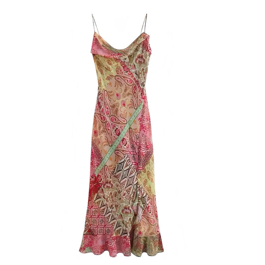 Izabella multicolor patchwork patterned bodycon maxi slip dress in pink, yellow, floral print, geometric slim fit silhouette with sleeveless spaghetti straps, scoop cowl neckline, draped cowl neck, backless design. Chic trendy boho chic Ibiza style Euro summer sundress for women & teens. Perfect for festivals, parties, prom, hoco, evening, going out, sexy summer vacation 2025 fashion. Ships worldwide to USA, UK, Canada, Australia, New Zealand, Europe, Asia.