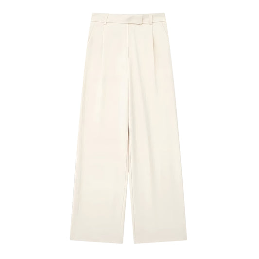 Light beige low-rise pleated tailored straight leg trouser pants for women made with smooth woven suiting fabric. Elegant and minimalist, featuring a sleek, structured fit and soft neutral tone. Designed for capsule wardrobes and versatile styling from office to evening wear. Perfect for Scandinavian, European, and classic minimalist fashion aesthetics. Ships globally and worldwide to US, UK, Canada, Australia, and Europe.
