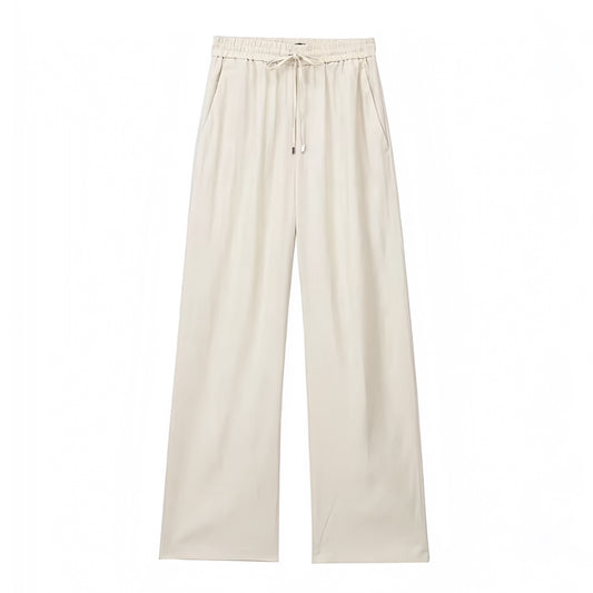 Light beige mid-rise linen wide leg drawstring pants for women featuring a breathable woven fabric and adjustable waistband. Relaxed fit, full-length silhouette, and soft neutral tone ideal for beach vacations, resort wear, and minimalist summer outfits. Perfect for everyday casual or coastal style looks. Lightweight, comfy, and chic. Ships globally to the US, UK, Canada, Australia, Europe, and Asia including all major destinations.