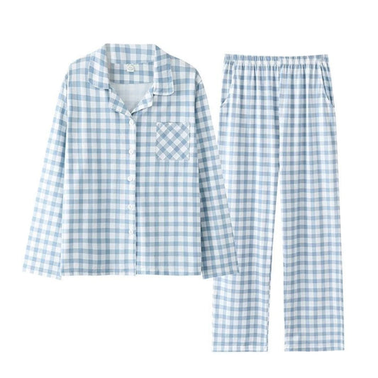 Light blue and white checkered cotton pajama set for women featuring a long sleeve button down collared top with front pocket and matching relaxed wide leg pants with pockets. Crafted from soft breathable cotton blend fabric, this two piece loungewear set combines cozy comfort with feminine charm. Perfect for lounging, sleeping, or travel. Inspired by Roller Rabbit and Eberjey. Ships globally to US, UK, Canada, Australia, New Zealand, Europe, and Asia.