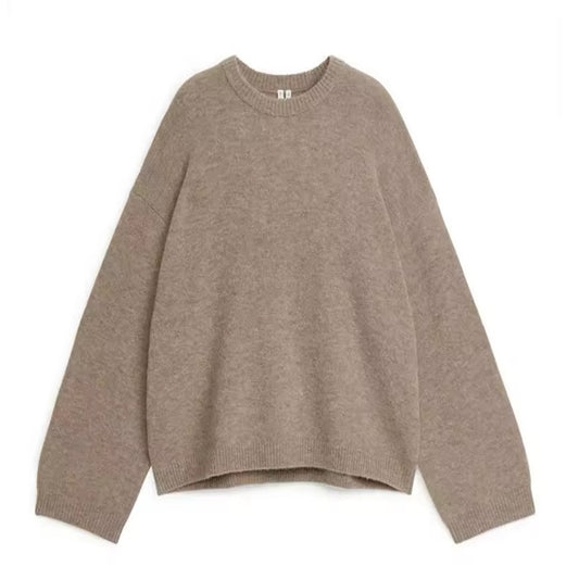 Light brown knit woolen oversized long sleeve pullover sweater for women and teens. Soft, cozy, thick, and fuzzy chunky knitwear with crewneck and round neckline. Chocolate brown baggy jumper perfect for fall, autumn, and winter 2025. Feminine, elegant, and trendy Scandinavian-inspired preppy fashion for casual everyday wear. Cozy and warm knit sweater inspired by Copenhagen street style, Uggs, and pumpkin spice aesthetic. Ships globally to the US, UK, Canada, Australia, New Zealand, Europe, Asia, France.