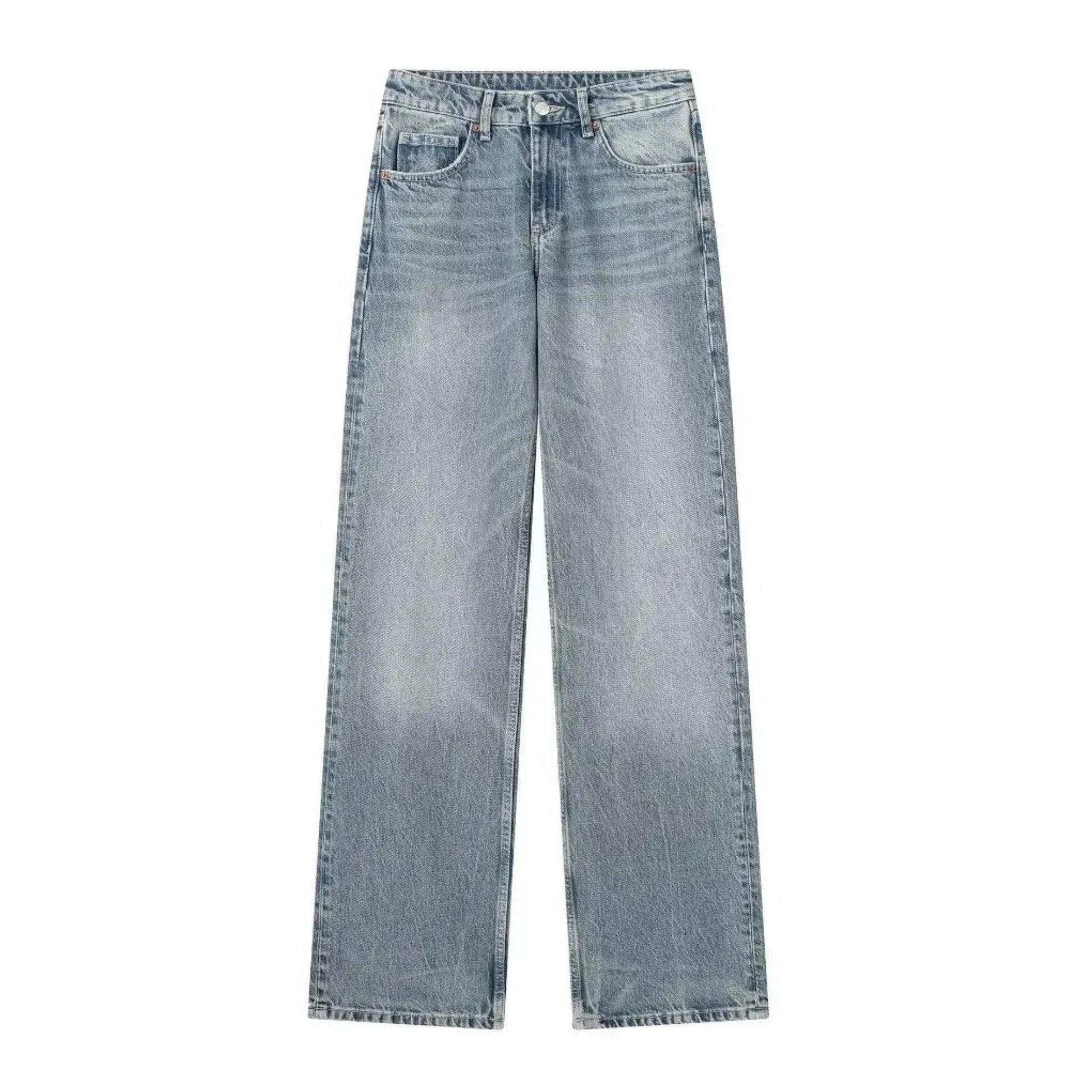 Light grey blue faded mid-rise wide leg denim jeans for women featuring a relaxed, full-length silhouette and soft cotton blend material. Vintage-inspired light wash denim with subtle fading for a lived-in, minimalist aesthetic. Perfect for everyday wear, casual outings, and clean Scandinavian street style looks. Ideal for all seasons including spring, summer, fall, and winter 2025. Ships globally and worldwide to the US, UK, Canada, Europe, and Australia.