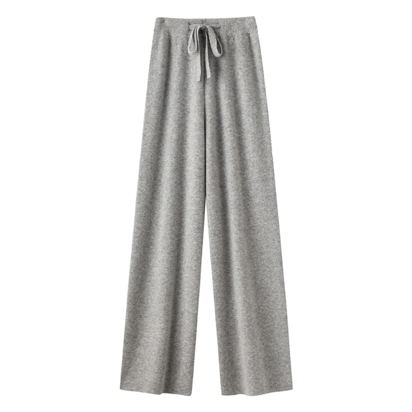 Light grey knit straight leg mid-rise lounge pants for women crafted from soft, cozy, and thick knitted fabric. These elegant knitwear trousers feature a full-length relaxed silhouette with a flattering straight leg fit. Perfect for casual, minimalist, or Scandinavian-inspired outfits, these lounge pants are ideal for everyday comfort, streetwear, or après-ski style. Ships globally and worldwide to the US, UK, Canada, Australia, and throughout Europe.