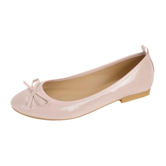 Light pink faux patent leather ballet flats with bow detail and glossy high-shine finish. Features a smooth, vegan-friendly design with cushioned insoles, round toe, and slim silhouette. Soft and comfy flats perfect for everyday wear, travel, or Parisian chic outfits. Feminine and elegant design inspired by coquette and old-money fashion aesthetics. Ships globally to US, UK, Canada, Australia, New Zealand, and across Europe and Asia.
