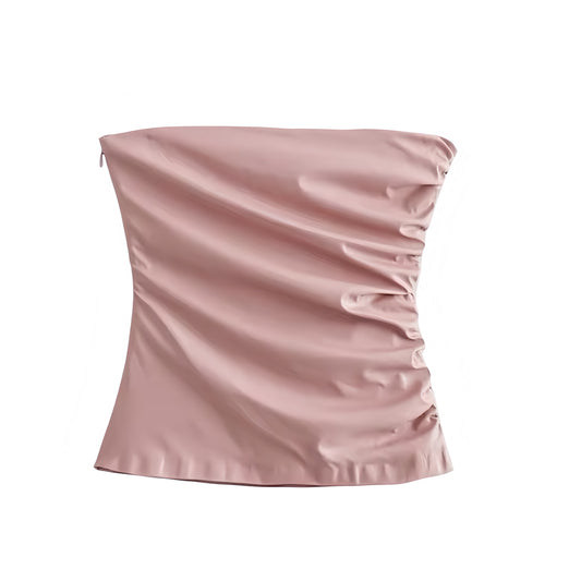 Light pink faux leather slim fit strapless tube top with ruched bodycon silhouette. Bustier corset-inspired bandeau crop top with square neckline, sleeveless solid chic design. Women’s and teens’ summer and fall 2025 fashion. Feminine coquette Y2K trendy stylish crop blouse perfect for holiday, vacation, casual everyday outfits, sorority rush, elegant evening wear, party, night out, going out, sexy club wear, rave, festival, and concert fashion. Ships worldwide to USA, Australia, New Zealand, UK, CA, Europe