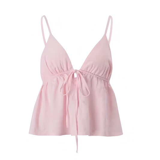 Light pink baby pink pastel pink slim fit V neck backless camisole tank top with spaghetti strap sleeveless design and ruffle trim bow embellished details. Flowy pleated plisse peplum babydoll style crop top blouse for womens teens ladies. Y2K style coquette top dollette fashion soft girl style clean girl outfits boho chic bohemian streetwear fashion hot girl outfit baddie outfits scandi style.

