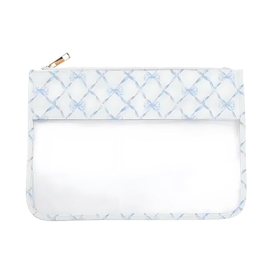 Mini blue and white bow print clear waterproof makeup pouch featuring a transparent design, metallic zipper, and lightweight vegan-friendly plastic material. Perfect for organizing cosmetics, toiletries, and travel essentials. Feminine coquette-inspired style with a touch of Hamptons and coastal granddaughter fashion. Ships globally to the US, UK, Canada, Australia, New Zealand, Europe, and Asia.

