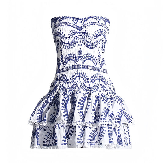 Mylopotas blue and white striped floral anglaise eyelet embroidered strapless smocked mini dress with layered ruffle trim and tiered flared skirt. Slim fit bodycon corset bustier silhouette with ruched shirred detailing. Chic summer sundress for womens teens ladies perfect for party dress prom hoco homecoming graduation beach vacation ibiza style boho chic resort wear coastal granddaughter aesthetic loveshackfancy dupe zimmerman dupe european summer fashion.

