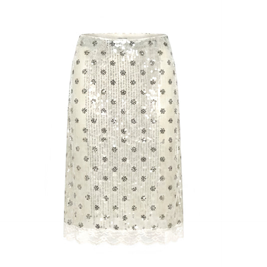 Polka dot sequin embellished lace trim slim fit low-rise midi skirt in white and black with white lace trim and floral lace details. Sparkly, shimmery, glittery bodycon pencil silhouette with low waist styling. Y2K 2000s fashion, coquette outfit, dollette outfit, soft feminine style, soft girl outfit, party outfit, night out, disco, rave, festival, Ibiza, baddie, mermaidcore and 2016 Tumblr style.