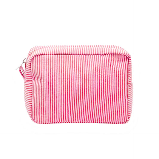 Red and white candy cane striped makeup bag with peppermint pinstripes, soft lightweight vegan-friendly linen material, medium-sized cosmetic pouch design, metallic zipper closure, and feminine holiday-inspired fashion aesthetic. Perfect for travel, toiletries, overnight essentials, Christmas gifts, preppy clean-girl organization, and everyday beauty storage. Global worldwide shipping available to US, Australia, New Zealand, UK, Canada, Europe, Asia, and more.
