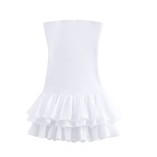 White Bodycon Layered Ruffle Drop Waist Strapless Mini Dress. Slim fit bodycon silhouette with chic layered ruffle trim, flared tutu peplum hem, strapless sleeveless design, and square neckline. Short white sundress for women, ladies, and teens who love feminine fashion for holidays, vacations, casual everyday wear, school, sorority rush, graduations, prom, hoco, homecoming, elegant evening wear, parties, night out, going-out looks, Euro summer, Stockholm style, boho chic, and preppy fashion. Ships worldwid