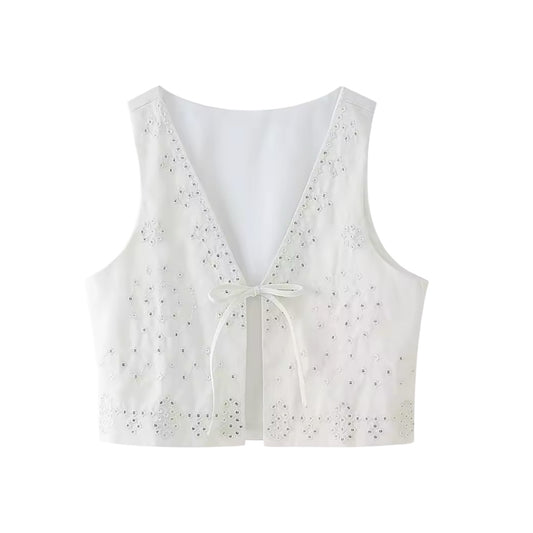 White embroidery sequin embellished boho V-neck vest crop top for women, teens, and ladies. Slim fit linen blouse with floral embroidered sequin detailing, geometric crochet patterns, sleeveless vest silhouette, split neckline, bow accents, and chic feminine cropped design. Perfect for summer 2025 casual everyday fashion, coastal granddaughter style, Euro summer, Ibiza beachwear, boho chic, Stockholm fashion, Mediterranean Greece resort wear, vintage retro & western styles, elegant evening outfits, party.