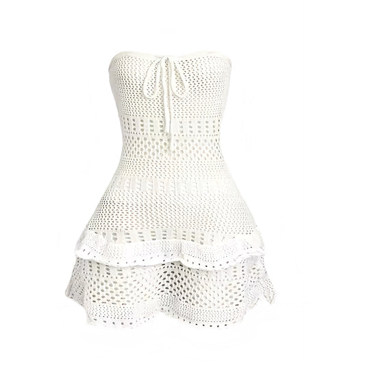 White off white cream white eyelet embroidered broderie crochet knit strapless bodycon mini dress with sweetheart neckline drop waist peplum layered ruffle tiered flared plisse pleated ruffled design. Slim fit bandeau backless sleeveless short sundress for women, teens, and ladies. Chic trendy casual elegant sexy beach dress for vacation, summer vacation, euro summer, Ibiza fashion, rave outfit, festival outfit, boho chic style, bohemian gypsy fashion, coastal granddaughter aesthetic, tropicalcore.