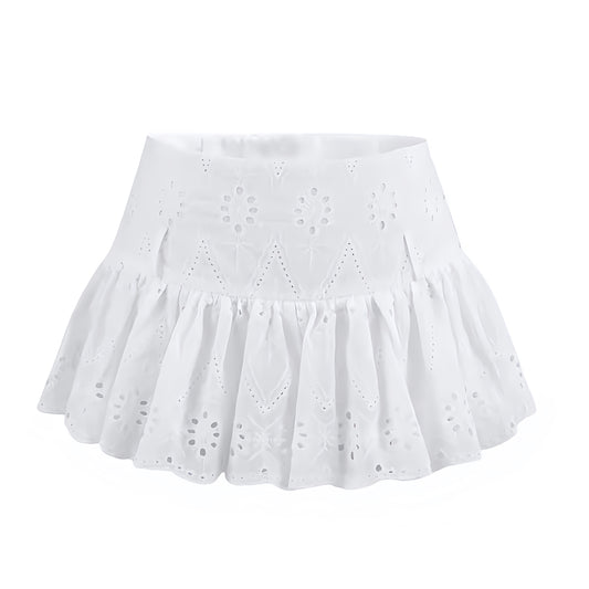 White eyelet embroidered ruffle trim low-rise mini skirt for women, teens, and ladies. Floral patterned slim fit A-line skirt with sheath, drop waist, layered ruffle trim, pleated, tiered, flared, peplum, and flowy tutu silhouette. Short mini skort style perfect for 2025 summer holidays, vacations, everyday casual looks, chic boho chic, Euro summer, Ibiza style, preppy Hamptons or Nantucket resort wear, coastal style, evening party, sorority rush, festival, concert, going out fashion. Ships worldwide.