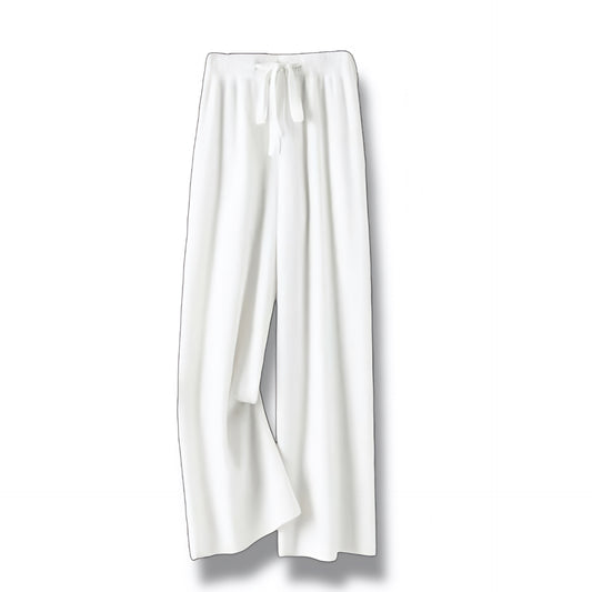 White knit wide leg mid-rise fleece pants in cream white and off white featuring soft cotton knit fleece lined fabric with cashmere woolen feel, thick warm yet lightweight insulated construction, relaxed straight leg silhouette, drawstring ribbed waistband, full length flattering fit with peachy bottom shape, luxury minimalist winter lounge pants for women with worldwide shipping