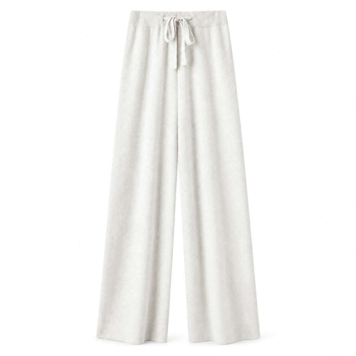 Cream white ivory off-white knit wide leg fleece pants for women with soft sweater-knit construction, ribbed fitted drawstring mid-rise waistband, relaxed baggy fit and full-length draped wide legs. Warm cozy elevated loungewear and knit trousers for fall winter 2026, winter white, clean girl, minimalist, quiet luxury, old money, Scandi, Stockholm, Copenhagen, Parisian, preppy, casual chic, airport, travel, college and everyday outfits.


