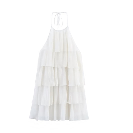 White layered ruffle trim sleeveless tiered backless halter mini dress with slim fit silhouette, plisse pleated flared A-line shape, and elegant layered ruffles. Short sundress for women, teens, and ladies, ideal for summer and fall 2025 holidays, vacations, casual everyday wear, brunch, evening, graduation, homecoming, hoco, school dances, parties, concerts, festivals, boho chic, euro summer, western cowgirl style, and preppy Stockholm style. Ships globally worldwide to US, Australia, New Zealand, UK, CA.