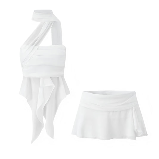 White Ruffle Trim Halter Top & Low-Rise Mini Skirt 2 Piece Set. Slim fit layered ruffle crop top with sleeveless halter neckline, mock neck detail, asymmetric cut, and flared silhouette paired with a low-rise mini skirt. Chic two-piece matching set for women, teens, and ladies who love feminine fashion for holidays, vacations, casual everyday wear, Y2K-inspired looks, sorority rush, dances, festivals, parties, night out, going-out outfits, sexy club wear, rave style, Ibiza fashion, Euro summer, boho chic