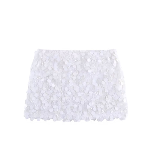 White sequin embellished beaded low rise mini skirt with metallic shimmer sparkle glitter sequined slim fit skinny fit bodycon pencil micro skirt design. Chic trendy casual elegant sexy skirt for women, teens, and ladies. Perfect for beach vacation, summer vacation, euro summer, Ibiza fashion, rave outfit, festival outfit, concert outfit, disco party, club wear, night out, going out, NYE outfit, boho chic style, y2k fashion, baddie aesthetic, star girl aesthetic, chrome, mermaidcore, tropicalcore, fairycore