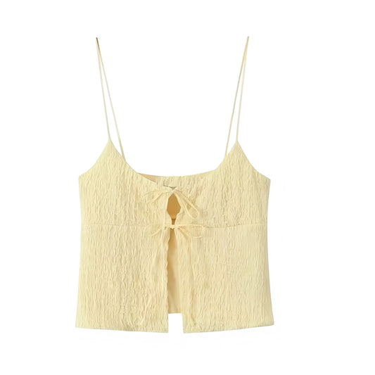 Butter yellow slim fit lace-up bow spaghetti strap crop tank top. Smocked shirred textured linen v neck split neck sleeveless backless blouse. Women’s and teens’ crop tank top for summer 2025. Feminine chic coquette Y2K trendy fashion for holiday, vacation, school, sorority, rush, party, night out, going out, sexy club wear, casual everyday wear, Stockholm street wear, Mediterranean euro summer style, preppy style. Ships worldwide to USA, Australia, New Zealand, UK, Canada, Germany, France, Ireland, Europe 